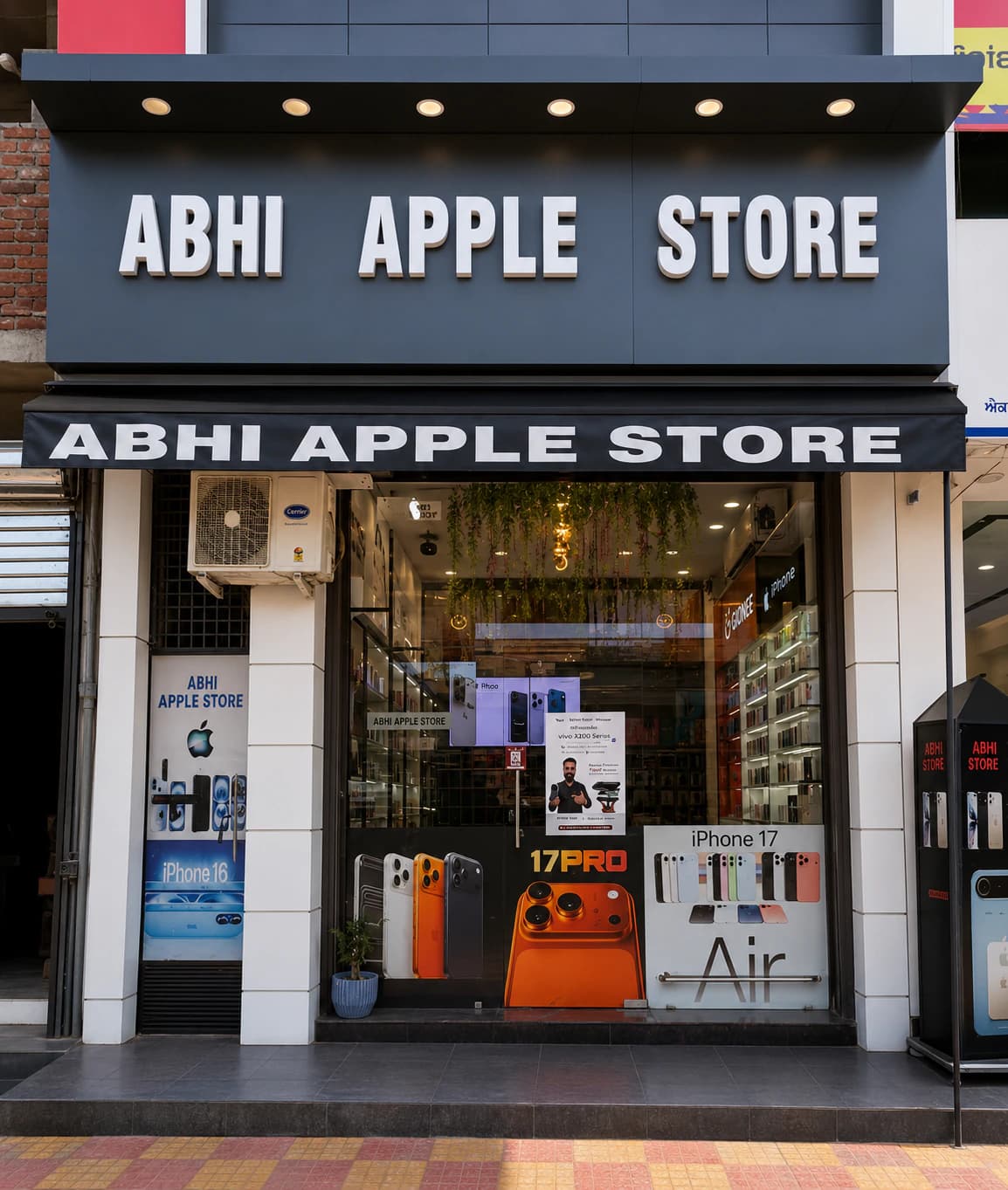 Exterior of Abhi Apple Store with the storefront and entrance visible